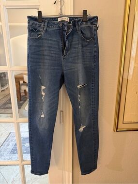 Distressed Mid-Blue Women’s The Super Skinny High Rise Jeans